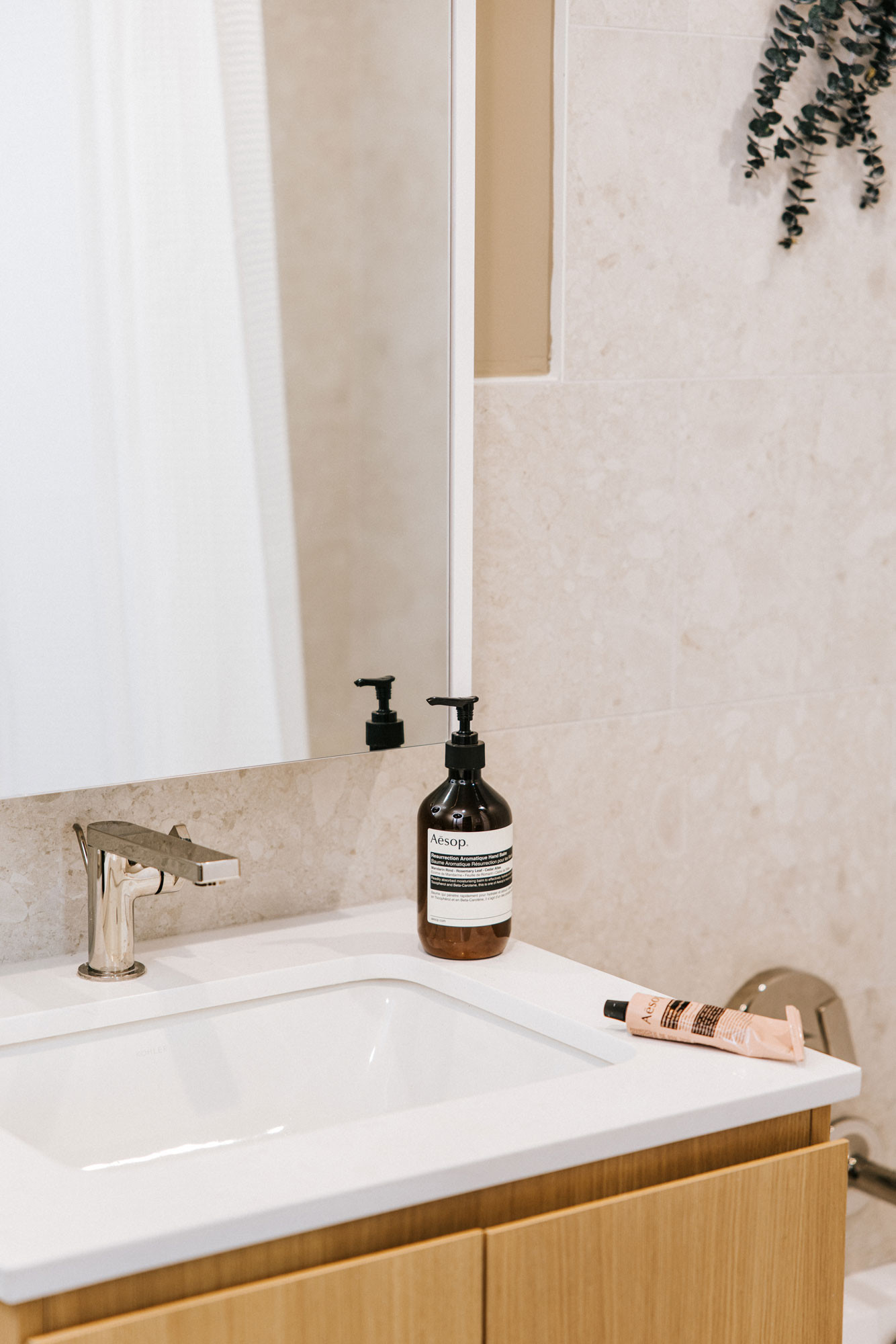 A bathroom vanity featuring high-end products.