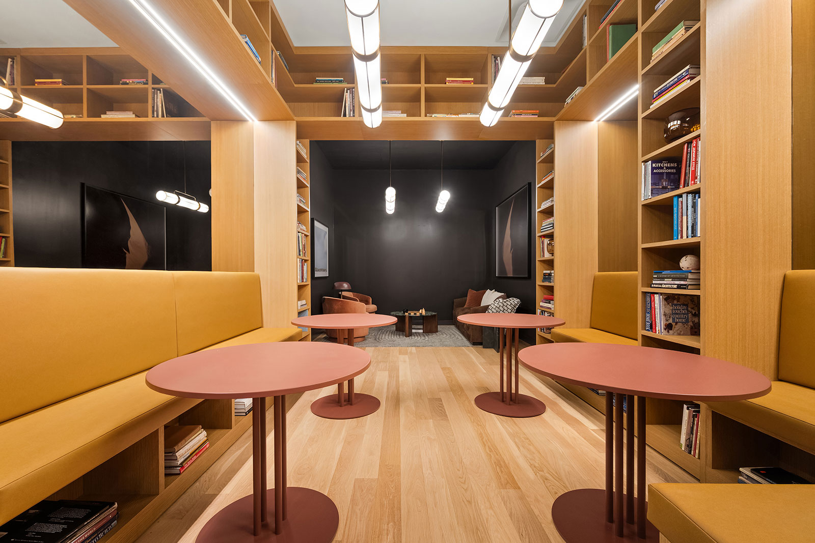 Workspace featuring library nooks, dedicated work pods, a conference room with AV capabilities, a coffee bar, and a printer located at 1975 Madison Ave.